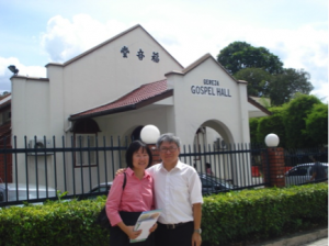 Couple in front of church